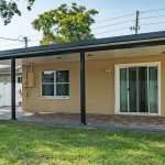 awesome backyard with an aluminum patio cover in clearwater